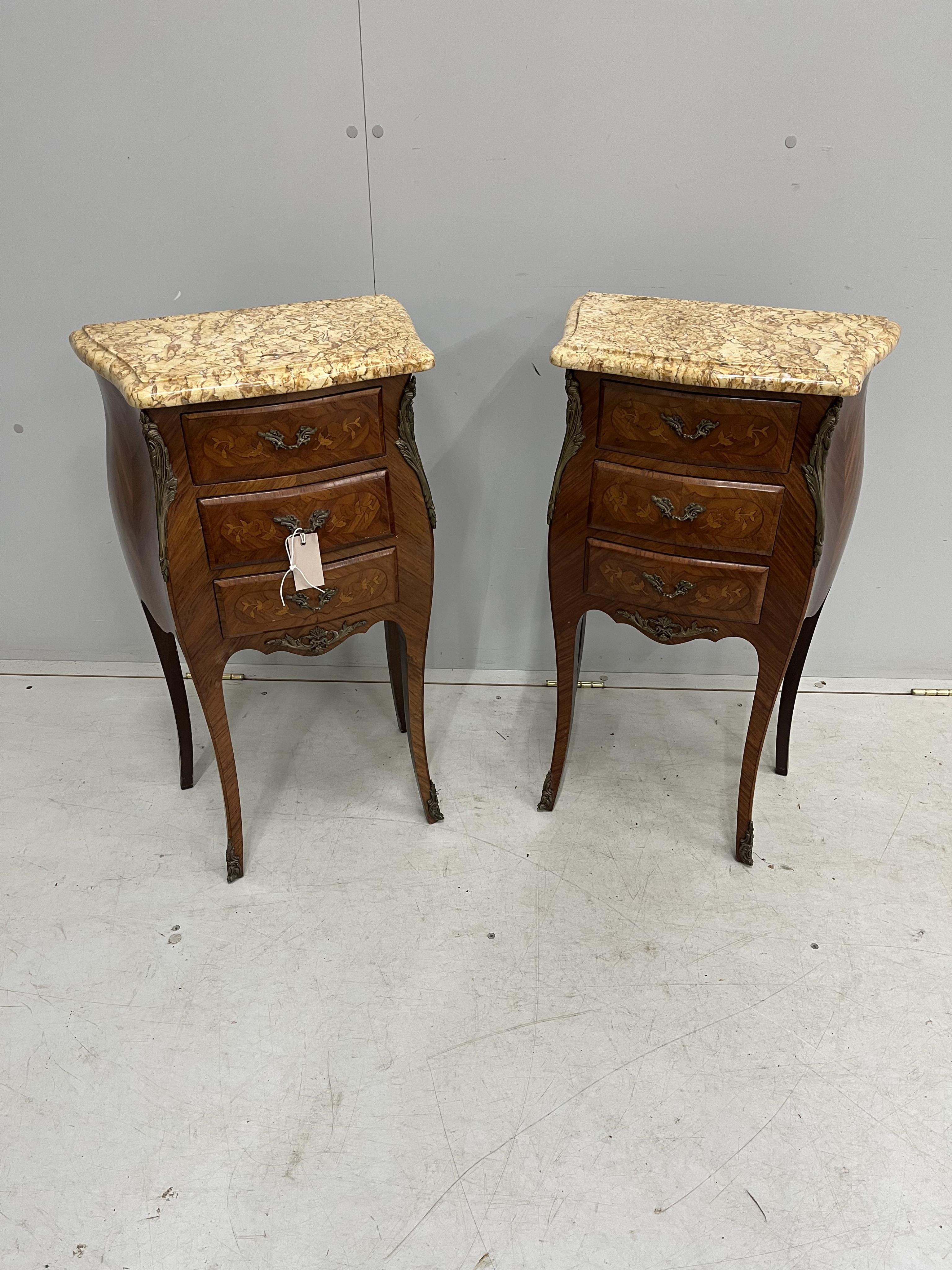 A pair of Louis XVI style gilt metal mounted and marquetry inlaid marble topped three drawer bedside chests, width 42cm, depth 27cm, height 74cm. Condition - good